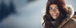 © ds17 - Young beautiful woman in a hat and winter jacket is resting in a ski resort