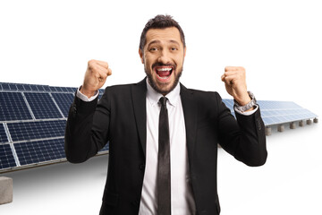 Sticker - Young businessman gesturing happiness at a solar farm