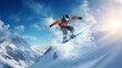 snowboarder is jumping with snowboard from snow hill
