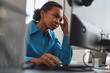 © Westend61 - Stressed computer programmer working on desktop PC in office