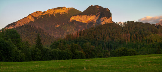 Wall Mural - peaks of the belianske tatras photographed from a mountain glade at sunset