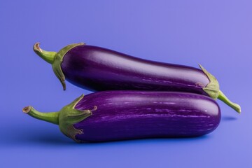 Wall Mural - Fresh brinjal on purple colour background.