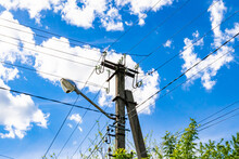 Power Electric Pole With Line Wire On Colored Background Close Up