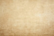 Vintage texture background resembling cardboard tones, featuring cream paper with old grunge retro rustic aesthetics for wall interiors. The surface appears like brown concrete mock parchment