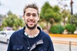 © Krakenimages.com - Young man smiling confident standing at street
