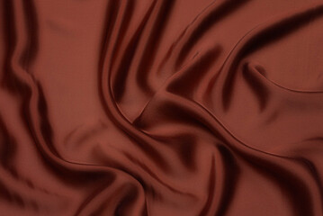Wall Mural - Close-up texture of natural cocoa fabric or cloth in same color. Fabric texture of natural cotton, silk or wool, or linen textile material. Red canvas background.