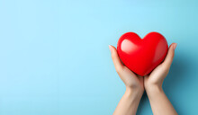 Red Heart In Hands On A Blue Background 1