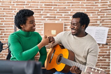 Sticker - African american man and woman music group bump fists at music studio