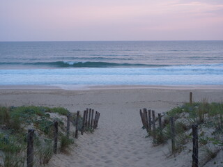 Wall Mural - A view of the Atlantic Ocean during the sunset. Cap Ferret, France - June 2023.