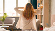 © Yuliia - Sunny morning at home bedroom girl wake up at hotel woman waking up after tranquil sleeping healthy sleep stretching in cozy bed female enjoy soft orthopedic mattress awake go away walking start day