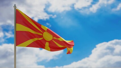 Poster - North Macedonia country national flag waving on blue sky background. 3d video footage