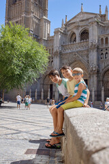 Family with children, siblings, visiting Toledo during family vacation summertime