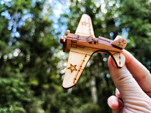Vintage Toy Wooden Airplane With Stars On Wing In Nature. Plane Crash, Breakdown. Old Soviet Glider From USSR Of Soviet Union. Military Aircraft From World War II And The Great Patriotic War Of Russia