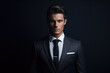 © thejokercze - Portrait of a businessman on dark background