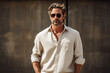 © Schizarty - Handsome 40 years old man in linen shirt on earthy tones background