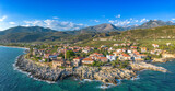 Fototapeta Most - Aerial view of the wonderful seaside village of Kardamyli, Greece located in the Messenian Mani area. It's one of the most beautiful places to visit in Greece, Europe