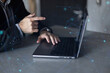 © DanielViero - Businessman finger point at laptop, big business analysis dashboard hologram