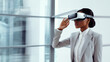 © Belkin Dmitrii - African american businesswoman with VR glasses in the business center