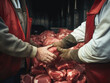 A closeup of a meat packers tired hands as they take a break after loading an entire truck with meat packages.