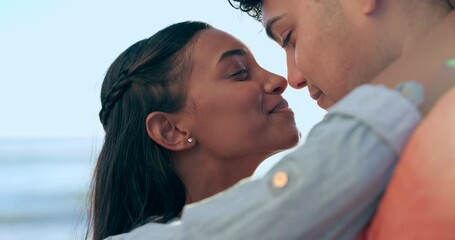 Poster - Love, happy and summer with couple at beach for travel vacation, kiss and bonding. Smile, holiday and relax with Indian man and woman on seaside date for freedom, romance and honeymoon together