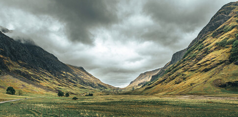 Wall Mural - The view of the Scottish Highlands along the highway in overcast weather