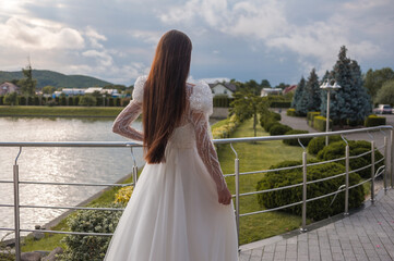 Wall Mural - Fashion bride in wedding dress. Summer wedding