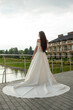 © alipko - Fashion bride in wedding dress. Summer wedding