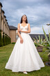 © alipko - Fashion bride in wedding dress. Summer wedding