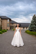 © alipko - Fashion bride in wedding dress. Summer wedding