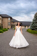 © alipko - Fashion bride in wedding dress. Summer wedding