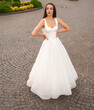 © alipko - Fashion bride in wedding dress. Summer wedding