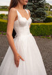 © alipko - Fashion bride in wedding dress. Summer wedding