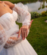 © alipko - Fashion bride in wedding dress. Summer wedding