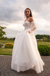 © alipko - Fashion bride in wedding dress. Summer wedding