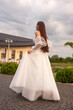 © alipko - Fashion bride in wedding dress. Summer wedding