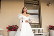 © alipko - Fashion bride in wedding dress. Summer wedding
