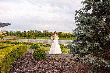 Wall Mural - Fashion bride in wedding dress. Summer wedding