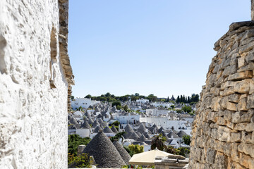 Wall Mural - Panormic view of the town of Alberobello with the typical limestone houses in the province of Bari, Puglia, Italy