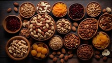 Assorted Nuts And Dried Fruit Background. Organic Food In Wooden Bowls, Top View.. Ai Generated