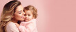 © Maureen - Portrait of a mother and child on pink background with copy space for text