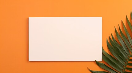 Poster - Minimal business brand template with blank paper sheet and dry palm leaf on orange background Flat lay top view . Mockup image