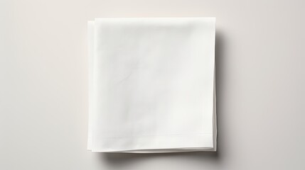 Poster - White kitchen napkin with copy space isolated on table background . Mockup image