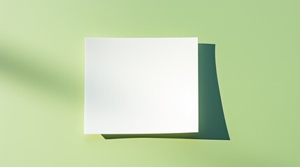 Poster - Top view of a blank card mockup on a green background with sunlight and shadow Neutral colored minimal business brand template
