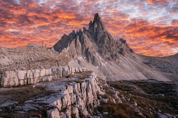 Wall Mural - Incredible view of Monte Paterno Paternkofel in Tre Cime di Lavaredo National Park during sunset. Dolomite Alps mountains, Trentino Alto Adige region, Sudtirol, Dolomites, Italy
