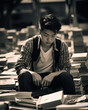 © RDO - Asian student studying in the library