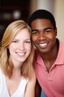 © stickerside - happy, smile and portrait of interracial couple for education, learning or growth in home