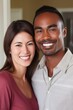 © stickerside - happy, smile and portrait of interracial couple for education, learning or growth in home