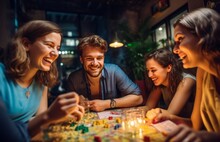 A Group Of Friends In A Great Mood Playing A Board Game