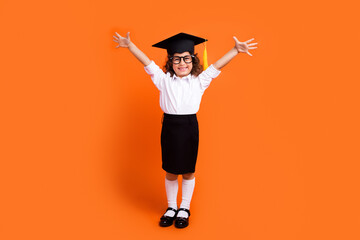 Wall Mural - Photo of excited schoolkid raise hands celebrate graduate school isolated vivid color background