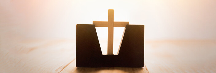 Canvas Print - wooden cross on table